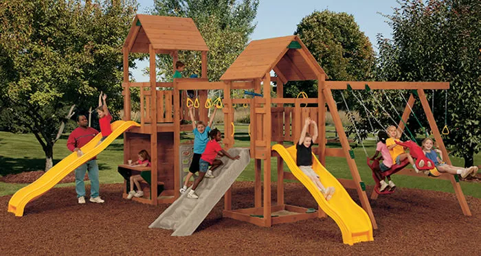 children using a wooden playset